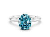White gold Oval Cut Blue Topaz Solitaire Ring with Thin Band and Four-Prong Setting_12