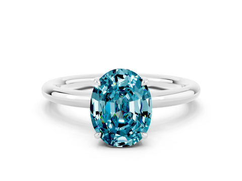 White gold Oval Cut Blue Topaz Solitaire Ring with Thin Band and Four-Prong Setting_12