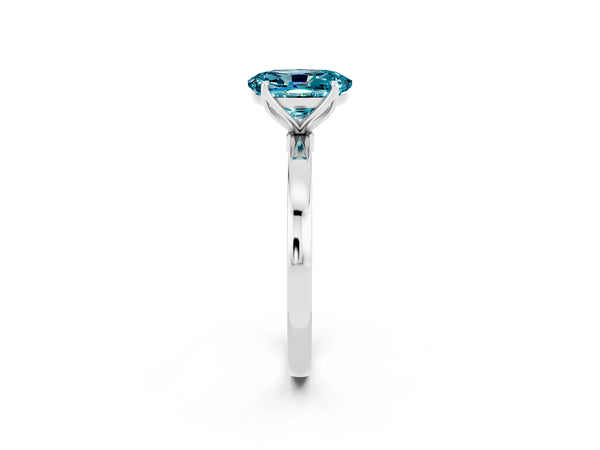 Platinum Oval Cut Blue Topaz Solitaire Ring with Thin Band and Prong Setting