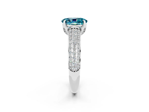 Silver Oval Cut Blue Topaz Solitaire Ring with Three-Row Pavé Band and Four-Prong Setting
