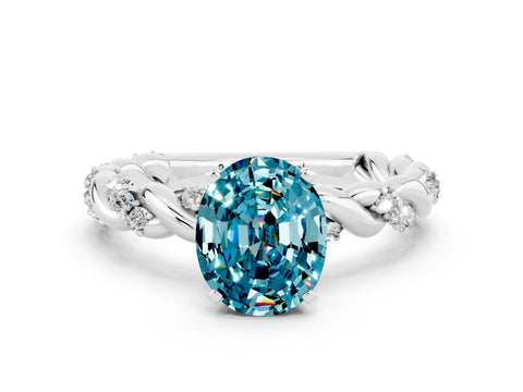 White gold Oval Cut Blue Topaz Solitaire Ring with Twisted Band and Pavé Accents