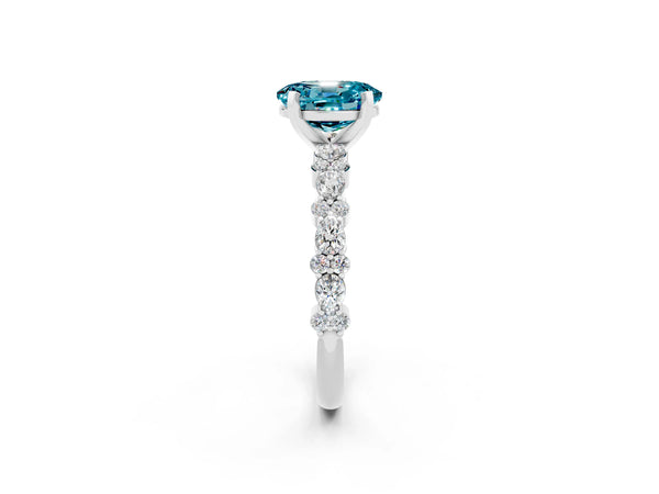 Silver Oval Cut Blue Topaz Side Stone Solitaire Ring with Round  and Four-Prong Setting