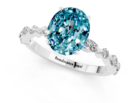 White gold Oval Cut Blue Topaz Solitaire with Side Stones on a Pavé Band and Four-Prong Setting_1