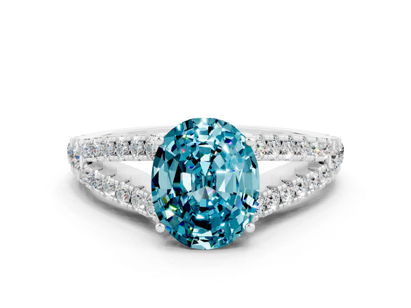 Platinum Oval Cut Blue Topaz Split Shank Pavé Engagement Ring with Four-Prong Setting