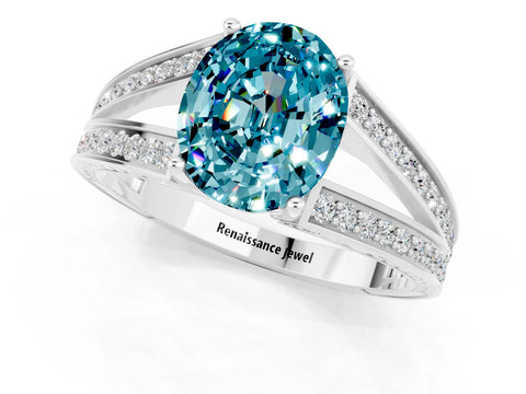 White gold Oval Cut Blue Topaz Split Shank Ring with Pavé Band and Four-Prong Setting_1