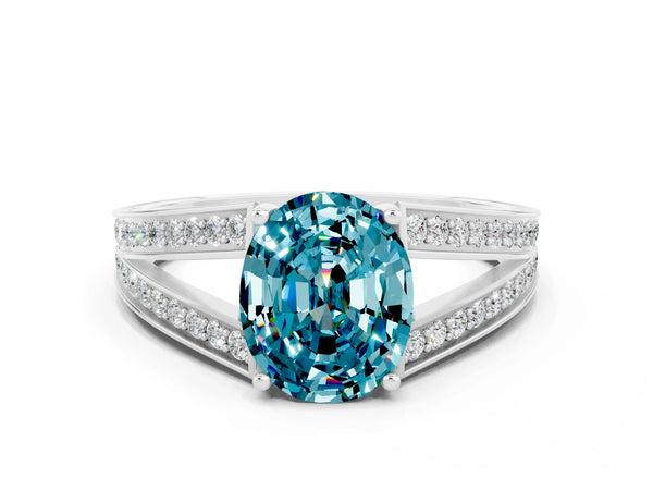 Silver Oval Cut Blue Topaz Split Shank Ring with Pavé Band and Four-Prong Setting
