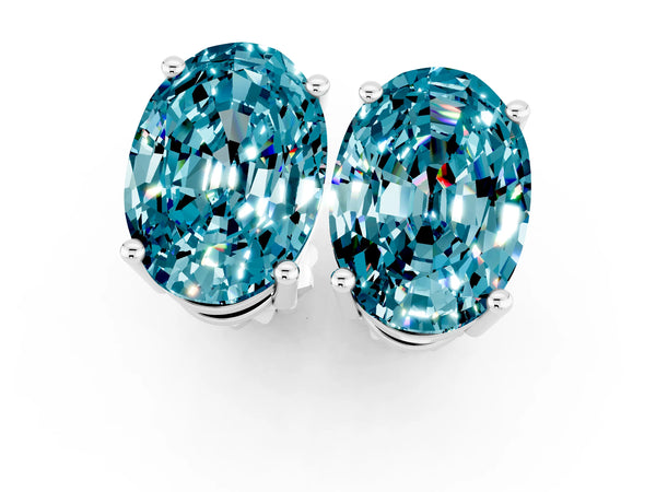 White gold Oval Cut Blue Topaz Stud Earrings