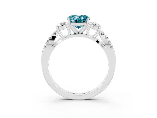 White gold Oval Cut Blue Topaz Three-Stone Ring with Pavé Split Shank and Four-Prong Setting