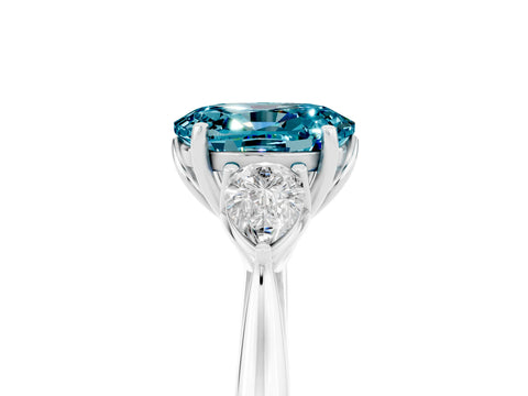 White gold Oval Cut Blue Topaz Three-Stone Ring with Pear Side Stones and Four-Prong Setting_17