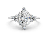 White gold Oval Cut Brilliant Diamond with Cluster Setting on a Beaded Band and Four-Prong Setting_155