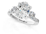 White gold Oval Cut Brilliant Three-Stone Diamond Ring with Pavé Band and Four-Prong Setting_8