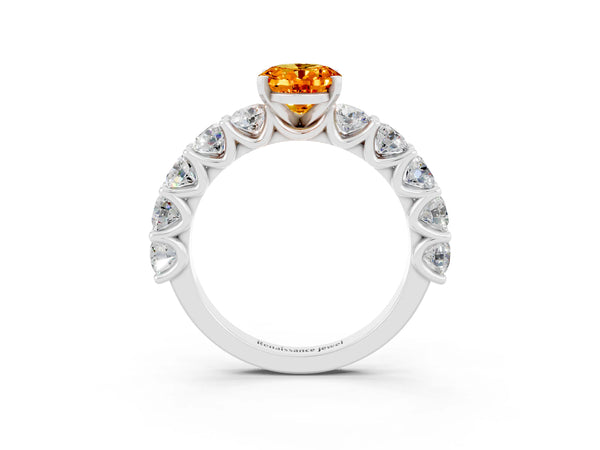 Silver Oval Cut Citrine Prong Setting with Side Stones on a Pave Band