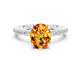 White gold Oval Cut Citrine Solitaire Engagement Ring with Pavé Band and Four-Prong Setting