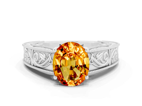 White gold Oval Cut Citrine Solitaire Ring with Engraved Band and Four-Prong Setting