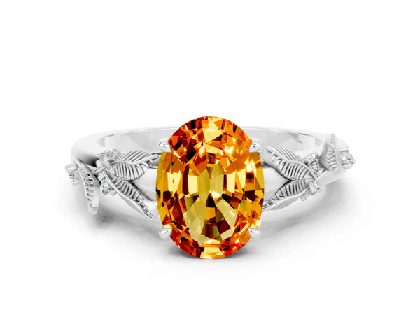 White gold Oval Cut Citrine Solitaire Ring with Leaf Motif Band and Four-Prong Setting