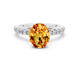 White gold Oval Cut Citrine Solitaire Ring with Pavé Accents and Four-Prong Setting
