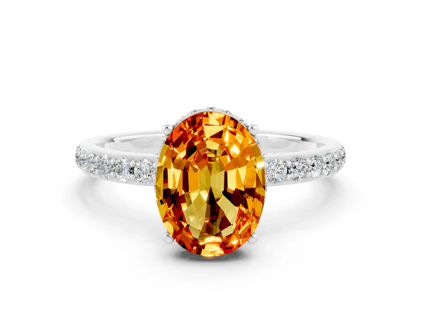 Silver Oval Cut Citrine Solitaire Ring with Pavé Band and Hidden Halo