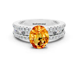 White gold Oval Cut Citrine Solitaire Ring with Pavé and Channel Set Band