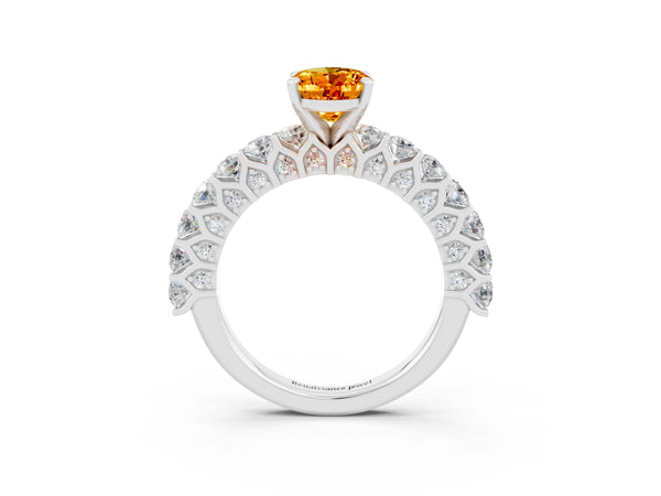 White gold Oval Cut Citrine Solitaire Ring with Shared Prong Pavé Band and Four-Prong Setting