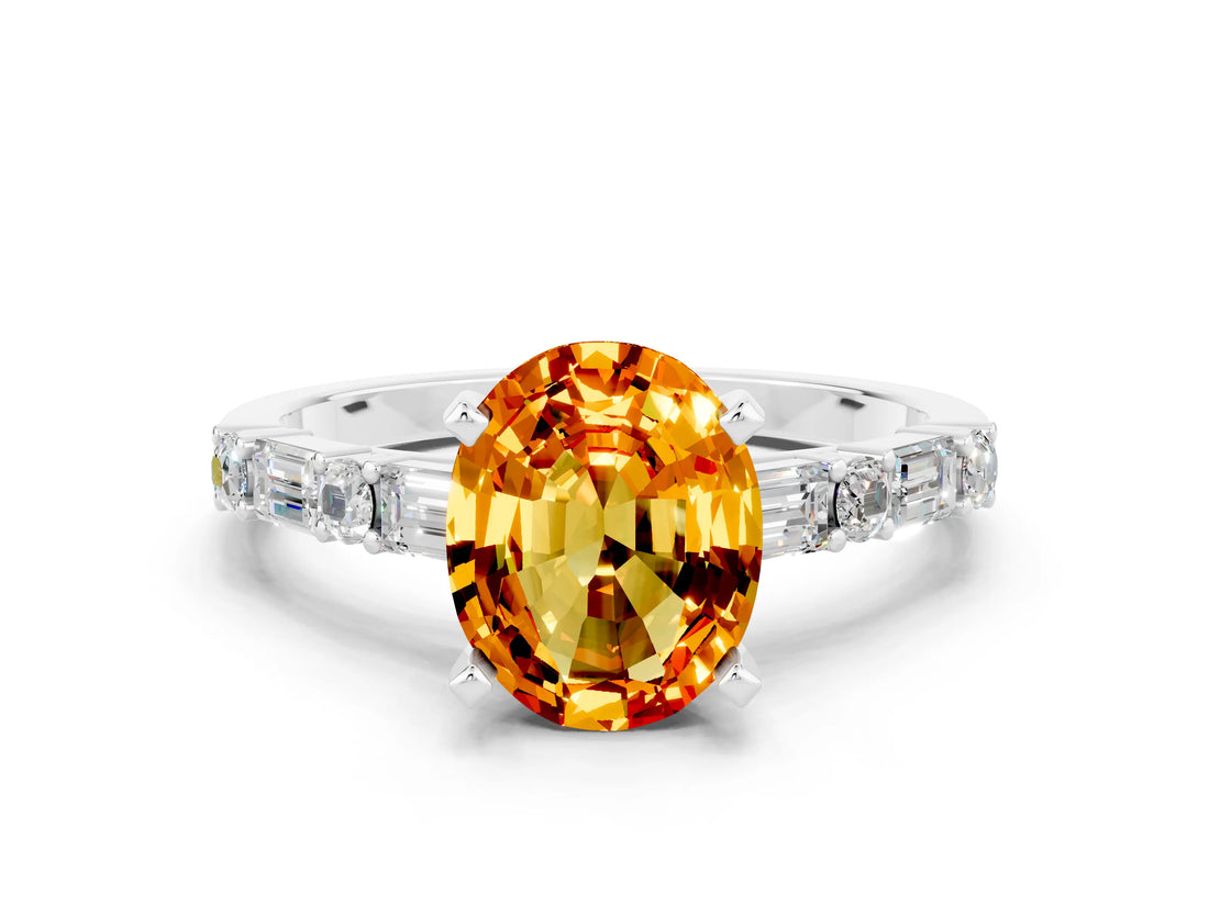 White gold Oval Cut Citrine Solitaire with Side Baguettes and Channel Set Band