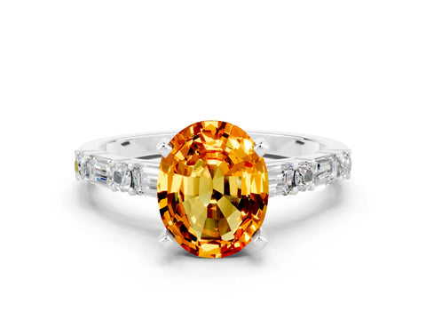 White gold Oval Cut Citrine Solitaire with Side Baguettes and Channel Set Band