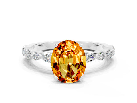 White gold Oval Cut Citrine Solitaire with Side Stones on a Pavé Band and Four-Prong Setting