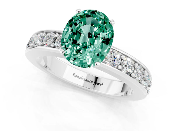 Platinum Oval Cut Green Sapphire Engagement Ring with Channel Set Round  Band and Prong Setting