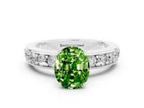 White gold Oval Cut Cut Channel Set Diamond Engagement Ring with Four-Prong Setting