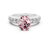White gold Oval Cut Cut Channel Set Diamond Engagement Ring with Four-Prong Setting