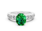 White gold Oval Cut Cut Channel Set Diamond Engagement Ring with Four-Prong Setting