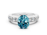 White gold Oval Cut Cut Channel Set Diamond Engagement Ring with Four-Prong Setting