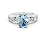 White gold Oval Cut Cut Channel Set Diamond Engagement Ring with Four-Prong Setting