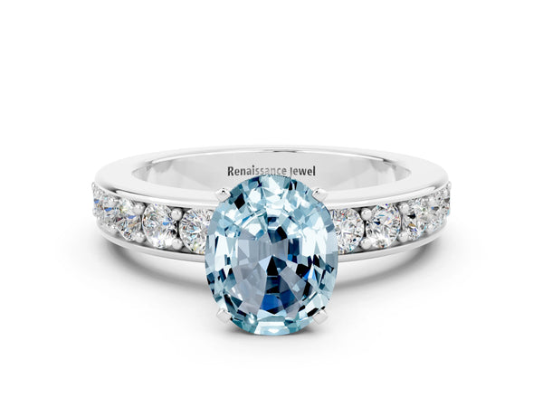 Silver Oval Cut Aquamarine Engagement Ring with Channel Set Round  Band and Prong Setting