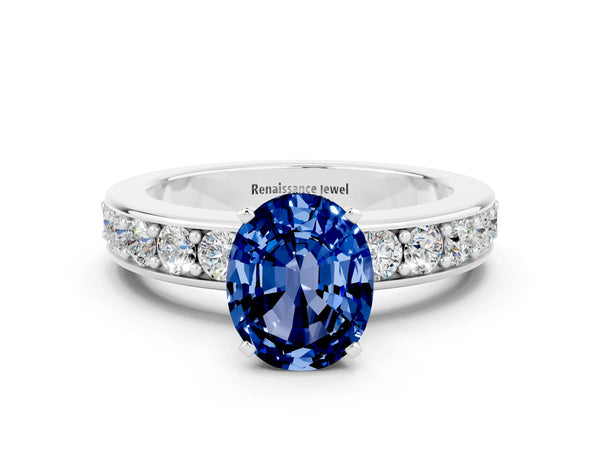 Silver Oval Cut Blue Sapphire Engagement Ring with Channel Set Round  Band and Prong Setting