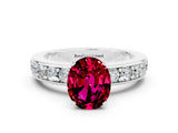 White gold Oval Cut Cut Channel Set Diamond Engagement Ring with Four-Prong Setting