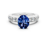 White gold Oval Cut Cut Channel Set Diamond Engagement Ring with Four-Prong Setting