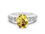 White gold Oval Cut Cut Channel Set Diamond Engagement Ring with Four-Prong Setting