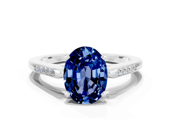 Silver Oval Cut Blue Sapphire Solitaire Ring with Channel Set Round Band and Prong Setting