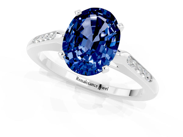 Silver Oval Cut Blue Sapphire Solitaire Ring with Channel Set Round Band and Prong Setting
