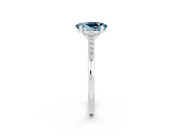 White gold Oval Cut Aquamarine Solitaire Ring with Channel Set Round Band and Prong Setting