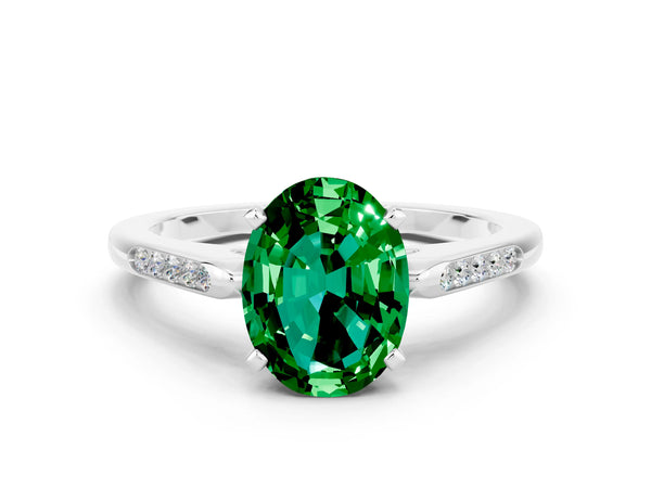 Platinum Oval Cut Emerald Solitaire Ring with Channel Set Round Band and Prong Setting