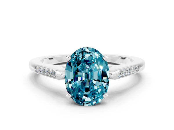 White gold Oval Cut Blue Topaz Solitaire Ring with Channel Set Round Band and Prong Setting