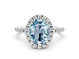 White gold Oval Cut Cut Diamond Floral Halo Engagement Ring with Pavé Band and Prong Setting