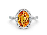 White gold Oval Cut Cut Diamond Floral Halo Engagement Ring with Pavé Band and Prong Setting