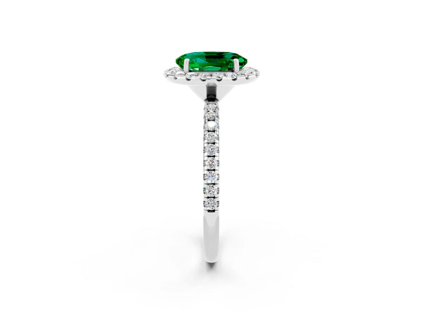 Silver Oval Cut Emerald Halo Engagement Ring with Round Pavé Band and Prong Setting