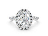 White gold Oval Cut Cut Diamond Floral Halo Engagement Ring with Pavé Band and Prong Setting