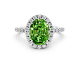 White gold Oval Cut Cut Diamond Floral Halo Engagement Ring with Pavé Band and Prong Setting