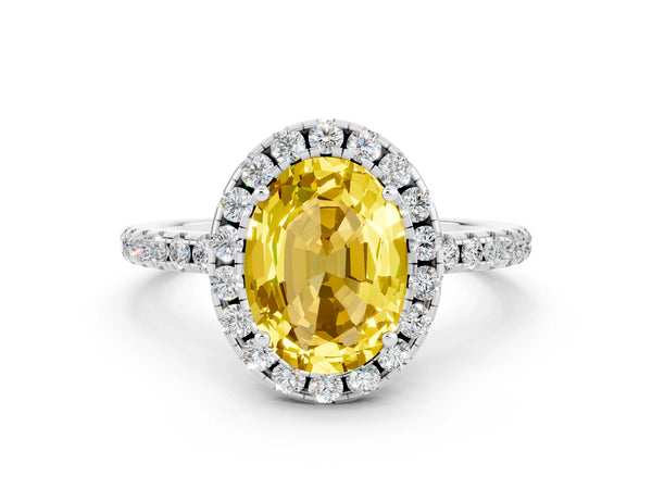 Silver Oval Cut Yellow Sapphire Halo Engagement Ring with Round Pavé Band and Prong Setting