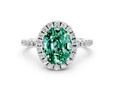 White gold Oval Cut Cut Diamond Floral Halo Engagement Ring with Pavé Band and Prong Setting