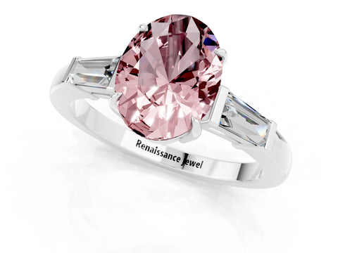 White gold Oval Cut Cut Diamond Ring with Tapered Baguette Side Stones in Four-Prong Setting_1